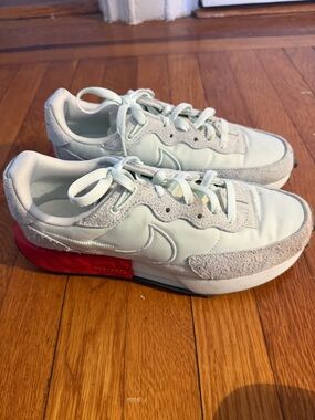Nike Low Top Sneakers in Light Mint with Red Heel Accent